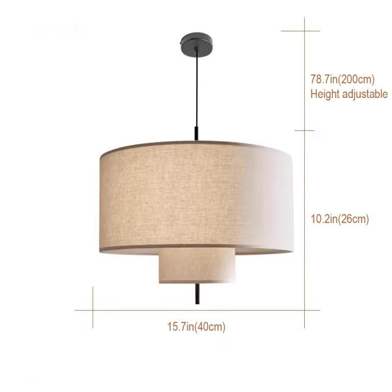 Modern Double-Layer Linen Drum Pendant Light hanging above a marble table with green plants and a black chair against a grey brick wall, ideal for living room and dining room decor
